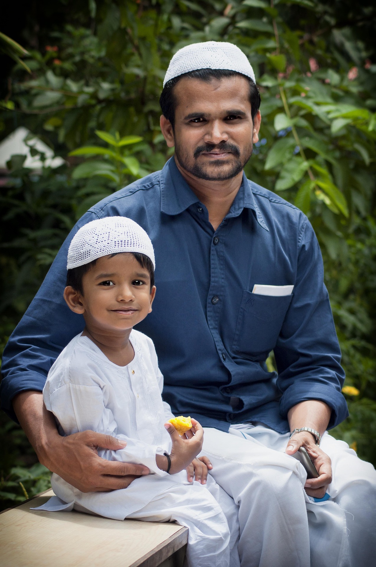 A Muslim father and son together